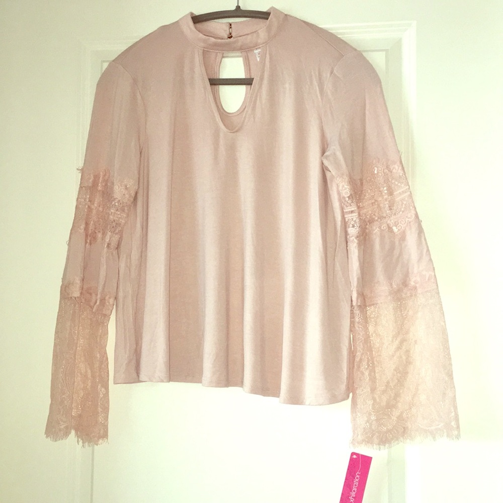 Pink long sleeved blouse